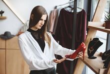 Stock-photo-woman-choosing-elegant-heels.jpeg